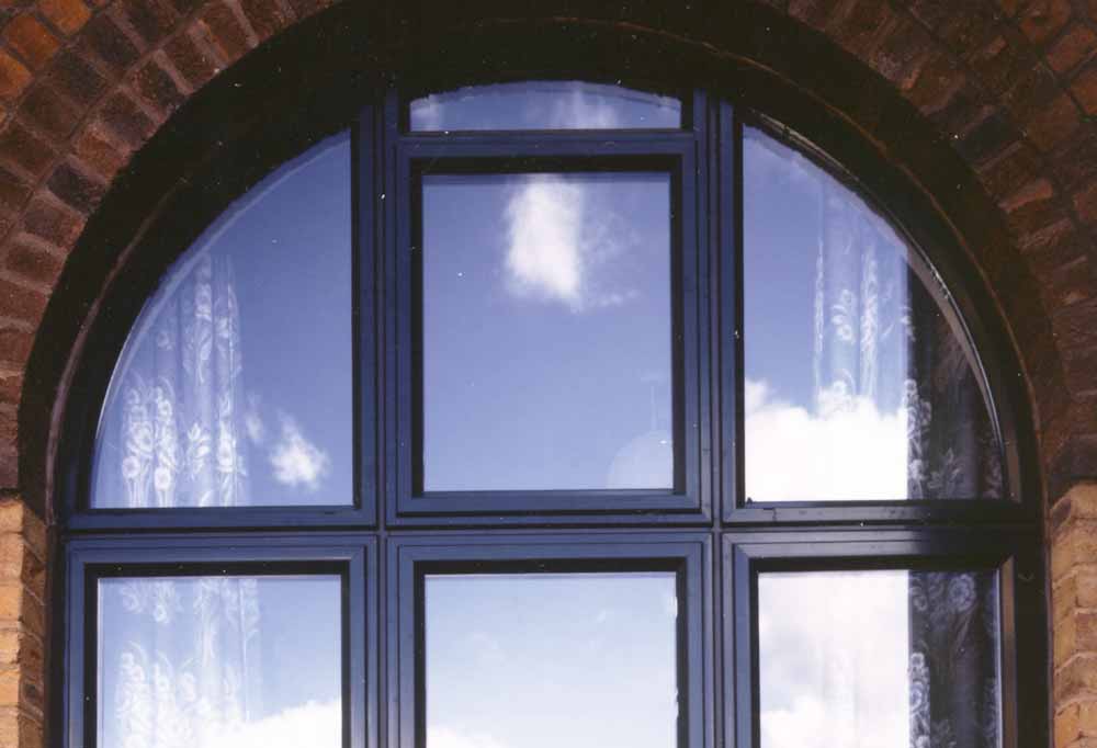 arched aluminium windows with black coating