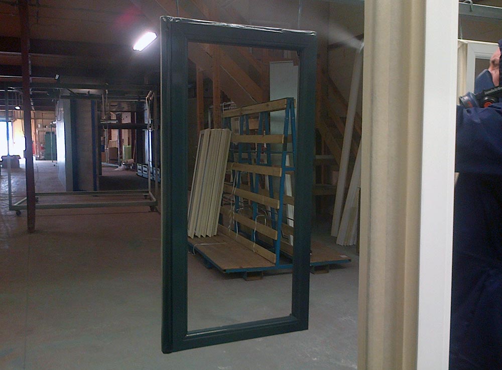 frame inside the factory being powder coated by someone