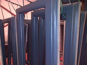 Powder coated window frames in our in-house powder coating facility
