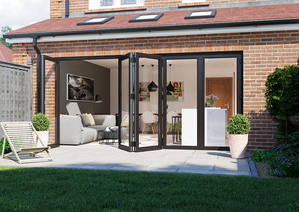 black three panel cortizo bi-fold doors opening into a homely living space