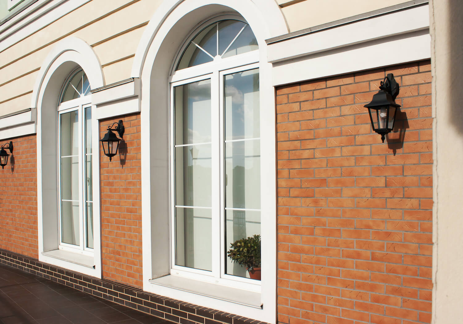 PVCu arched shaped windows which have been custom made for a customer